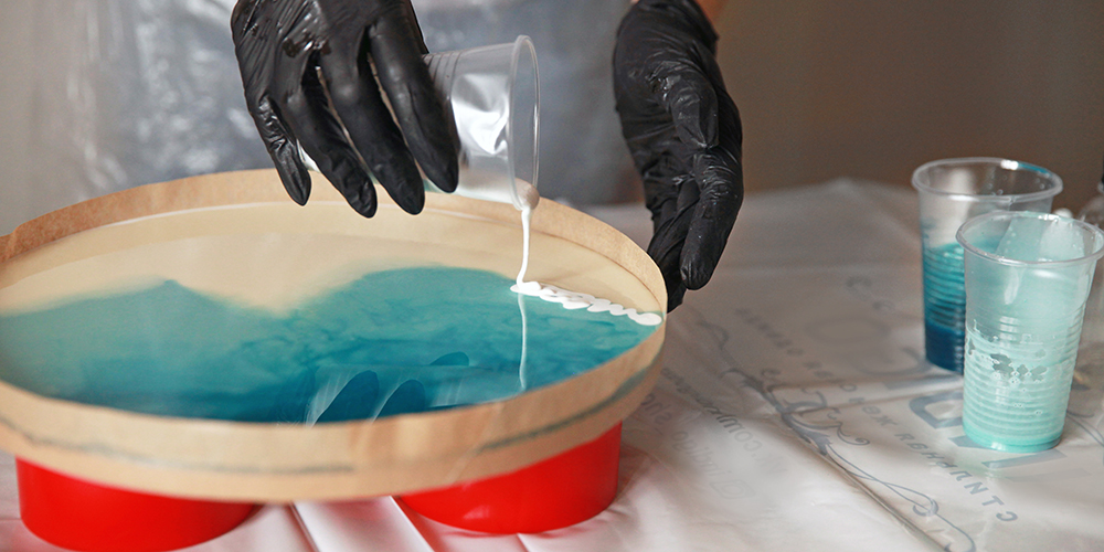 liquid art workshop, epoxy resin is poured on the surface. master class, hobby.